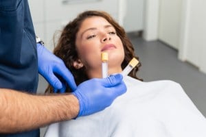 A woman in a dental chair 