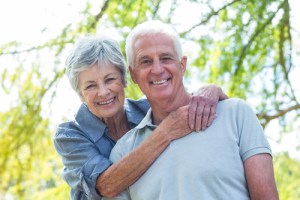 A smiling older couple