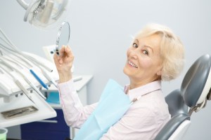 A senior in a dental chair